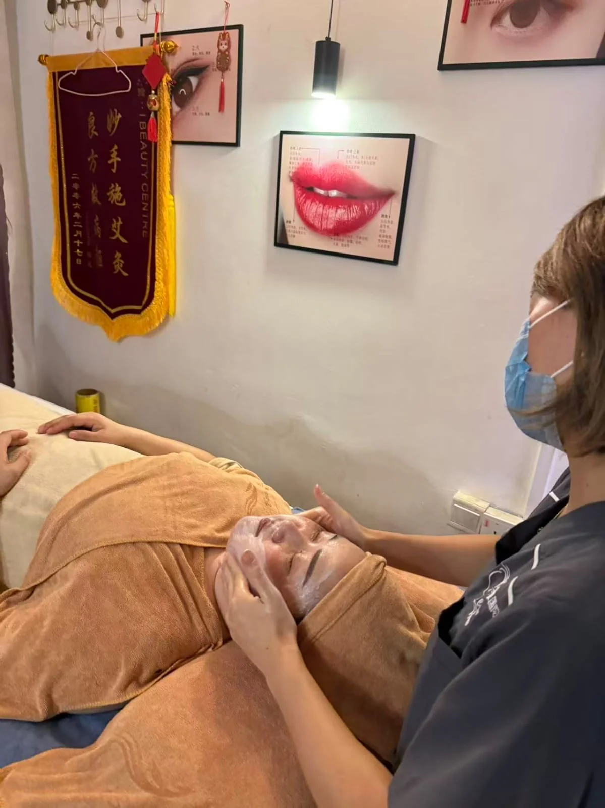 Actual facial treatment performed by an iBeauty Centre therapist
